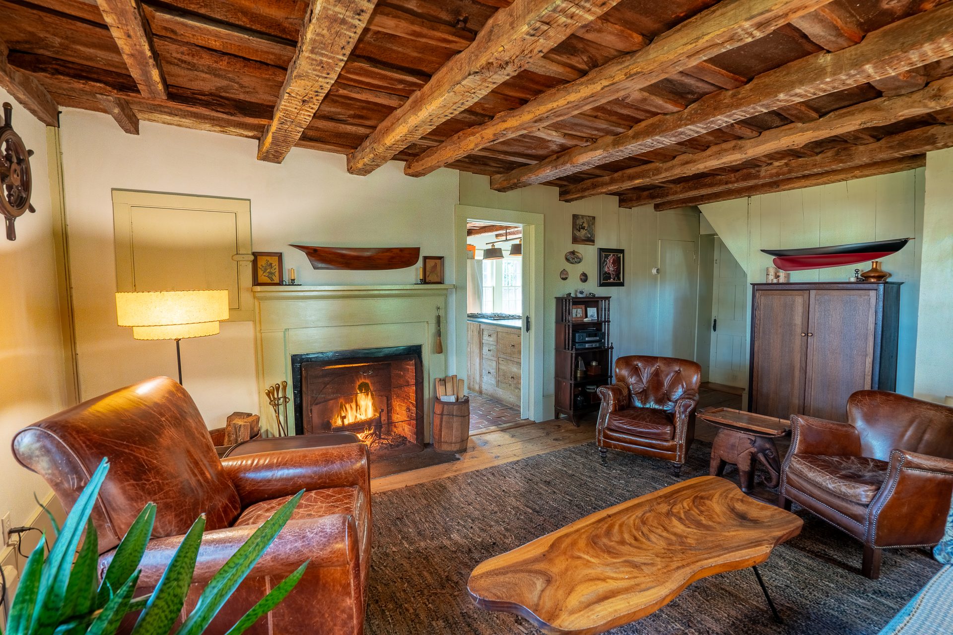 Snug with leather club chairs by the fire