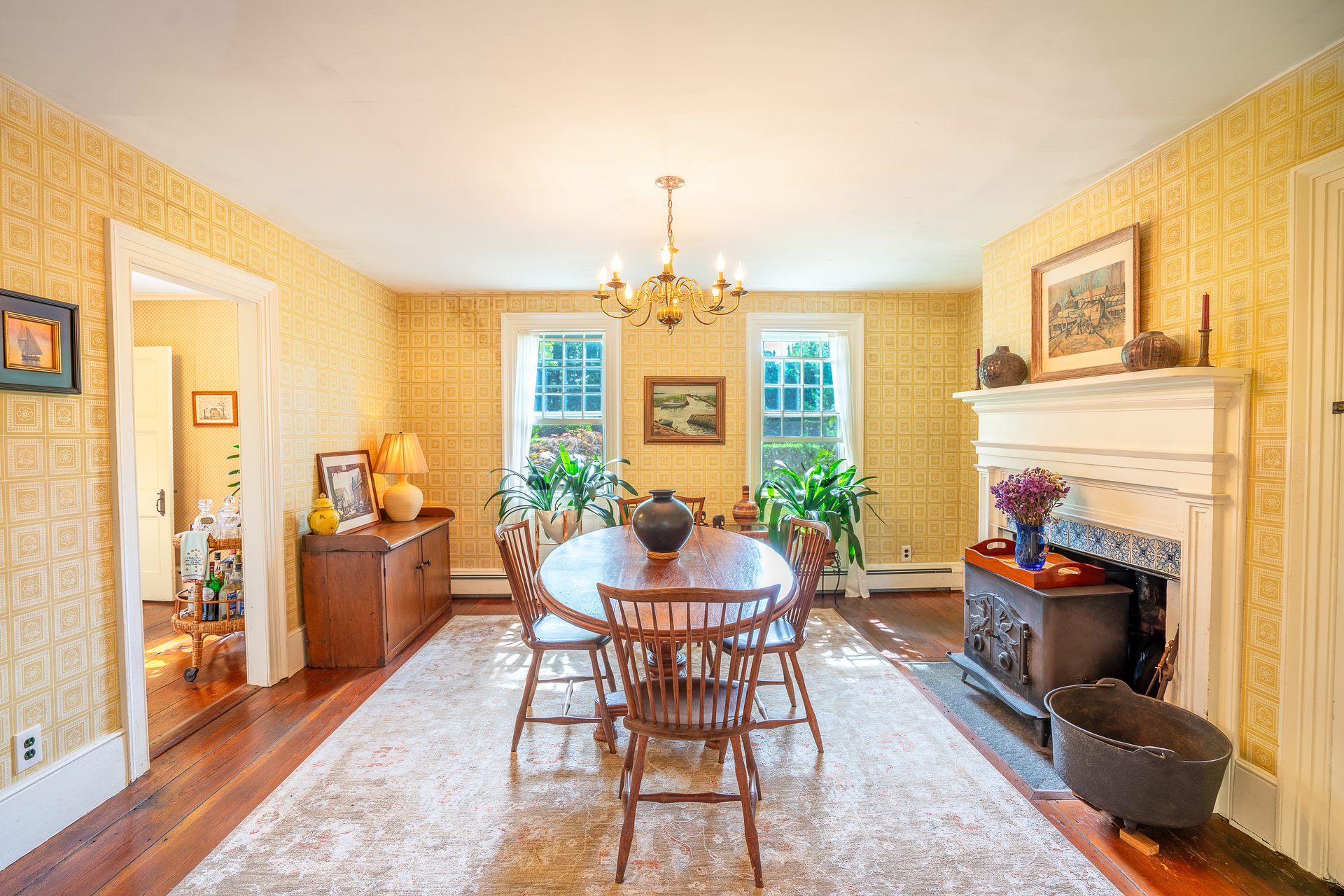 Formal dining room with period wallpaper